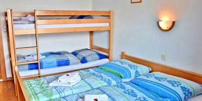 Monteurwohnung - Balkon - Österreich - Geräumige Wohnung für 4 - 6 Personen! 45 m" Apartment Rosskopf - großes Wohnzimmer - Astoria Apartments Wildschoenau