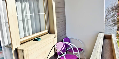 Monteurwohnung - Balkon - Österreich - Geräumige Wohnung für 4 - 6 Personen! 45 m" Apartment Rosskopf - großes Wohnzimmer - Astoria Apartments Wildschoenau