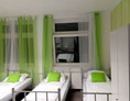 Monteurzimmer: Einzelbetten der Monteurzimmer NAG Boarding Houses in Hamburg - Rose