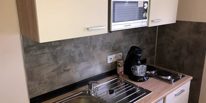 Monteurwohnung - Badezimmer: eigenes Bad - Münsterland - Singleküche - Wildpferdchen