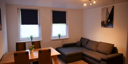 Monteurwohnung - Langelsheim - Beispiel Wohnzimmer mit Esstisch - Monteurwohnungen Lerbachtal