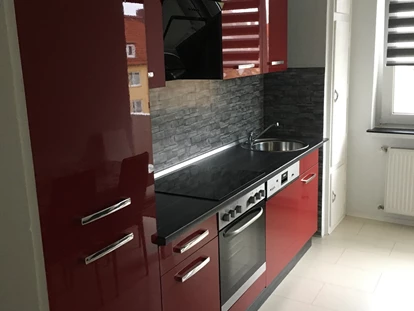 Monteurwohnung - Balkon - Deutschland - Detailfoto ( Küche in einer 3 Raum- Wohnung in Bremerhaven - Mitte im Zentrum .  - Cityhome Bremerhaven