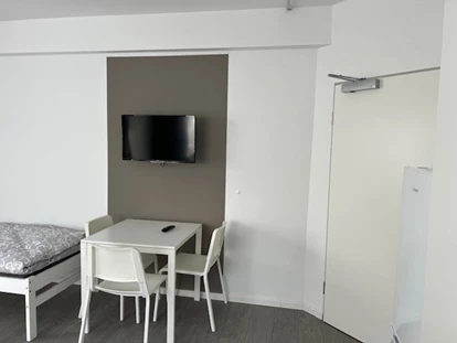 Monteurwohnung - Rödermark - Home4Time in Frankfurt - Unterkünfte für Monteure und Arbeiter  auf Zeit