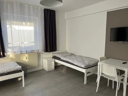 Monteurwohnung - Rödermark - Home4Time in Frankfurt - Unterkünfte für Monteure und Arbeiter  auf Zeit