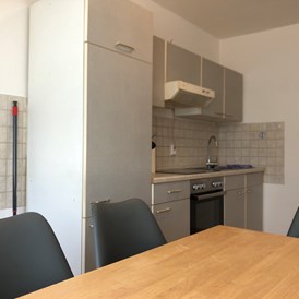 Monteurzimmer: Essbereich, Küche - (R132) Gemütliche Monteurwohnung 