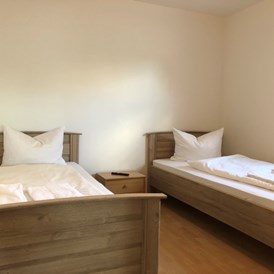 Monteurzimmer: Schlafzimmer - (R132) Gemütliche Monteurwohnung 