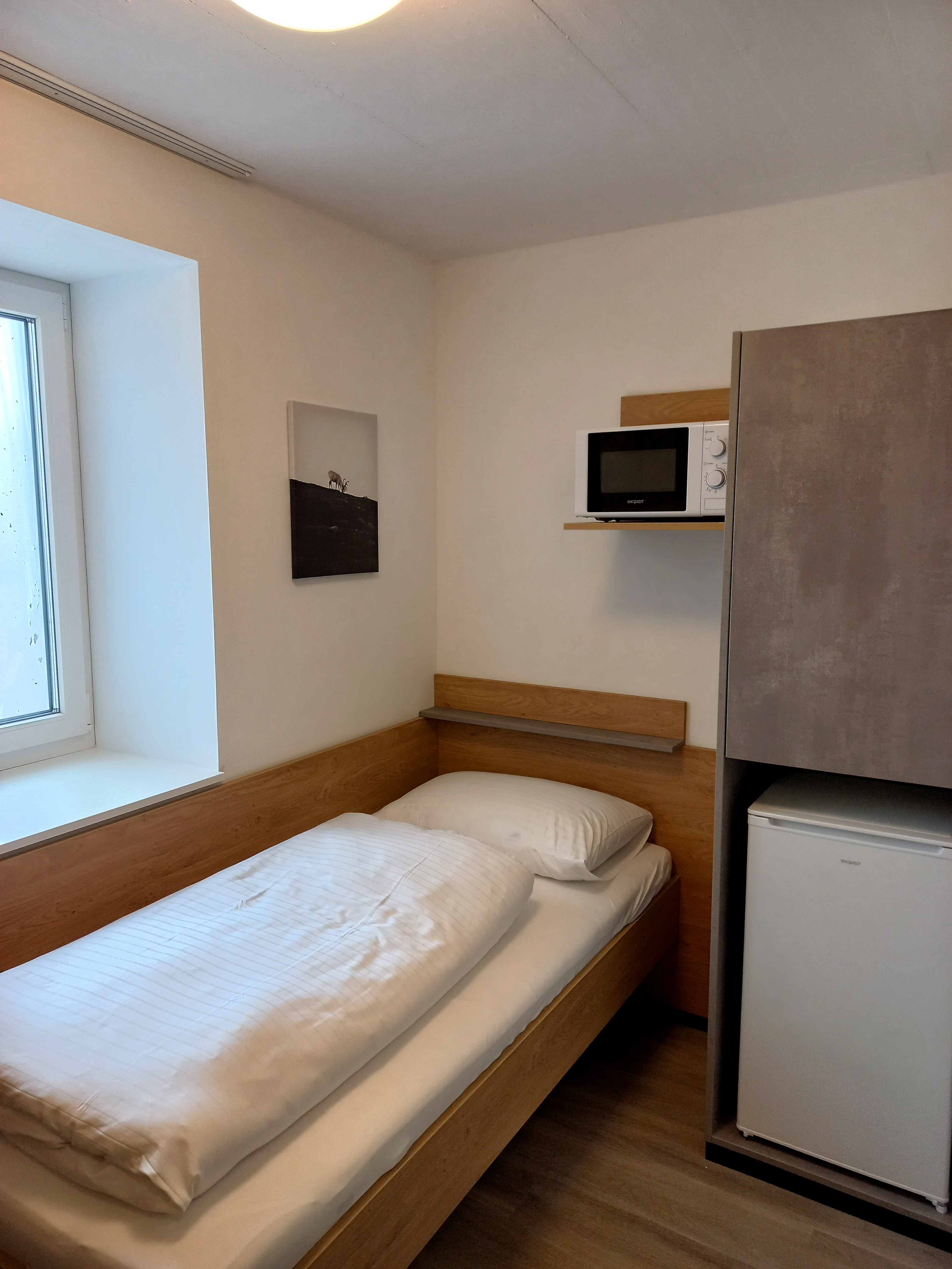 Monteurwohnung - TV - Oberösterreich - Bettansicht - Quartier Löwengrube