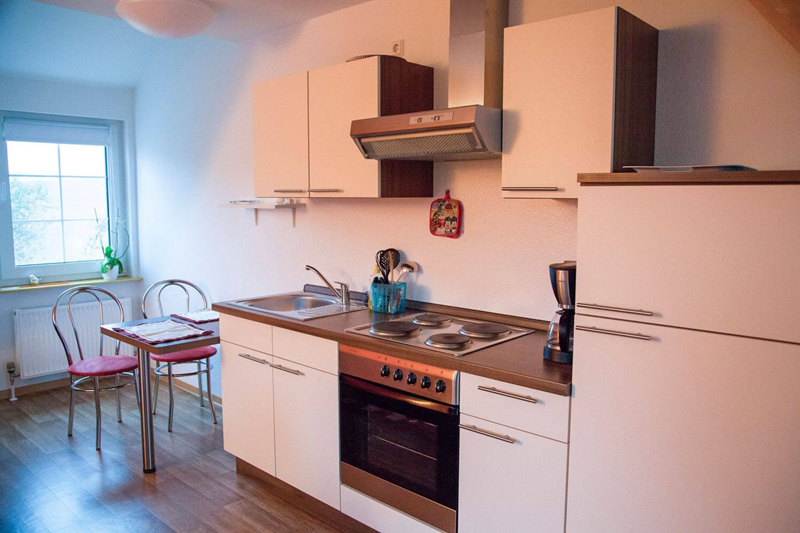 Monteurzimmer: Essbereich und Küche Wohnung  - Apartment Haus am Grün