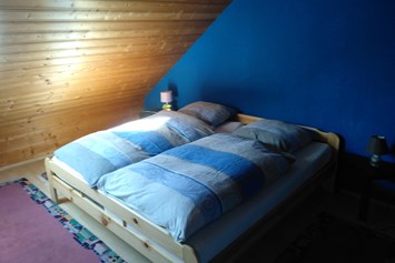 Monteurzimmer: Es ist noch ein weiteres Schlafzimmer mit Doppelbett vorhanden. - Ferienwohnung Veserde