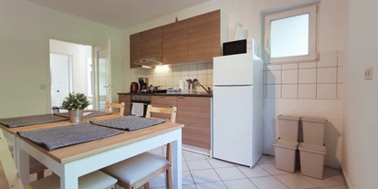 Monteurwohnung - Kaffeemaschine - Bielefeld - großer Essbereich - flex living -  Monteurwohnungen in Bielefeld