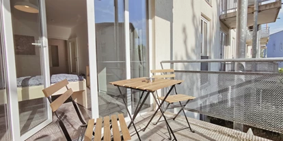 Monteurwohnung - Kaffeemaschine - Bielefeld - gemütlicher Balkon - flex living -  Monteurwohnungen in Bielefeld