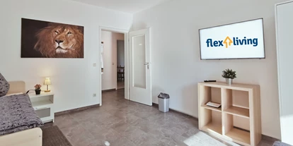 Monteurwohnung - Kaffeemaschine - Bielefeld - Einzelzimmer mit Smart TV - flex living -  Monteurwohnungen in Bielefeld