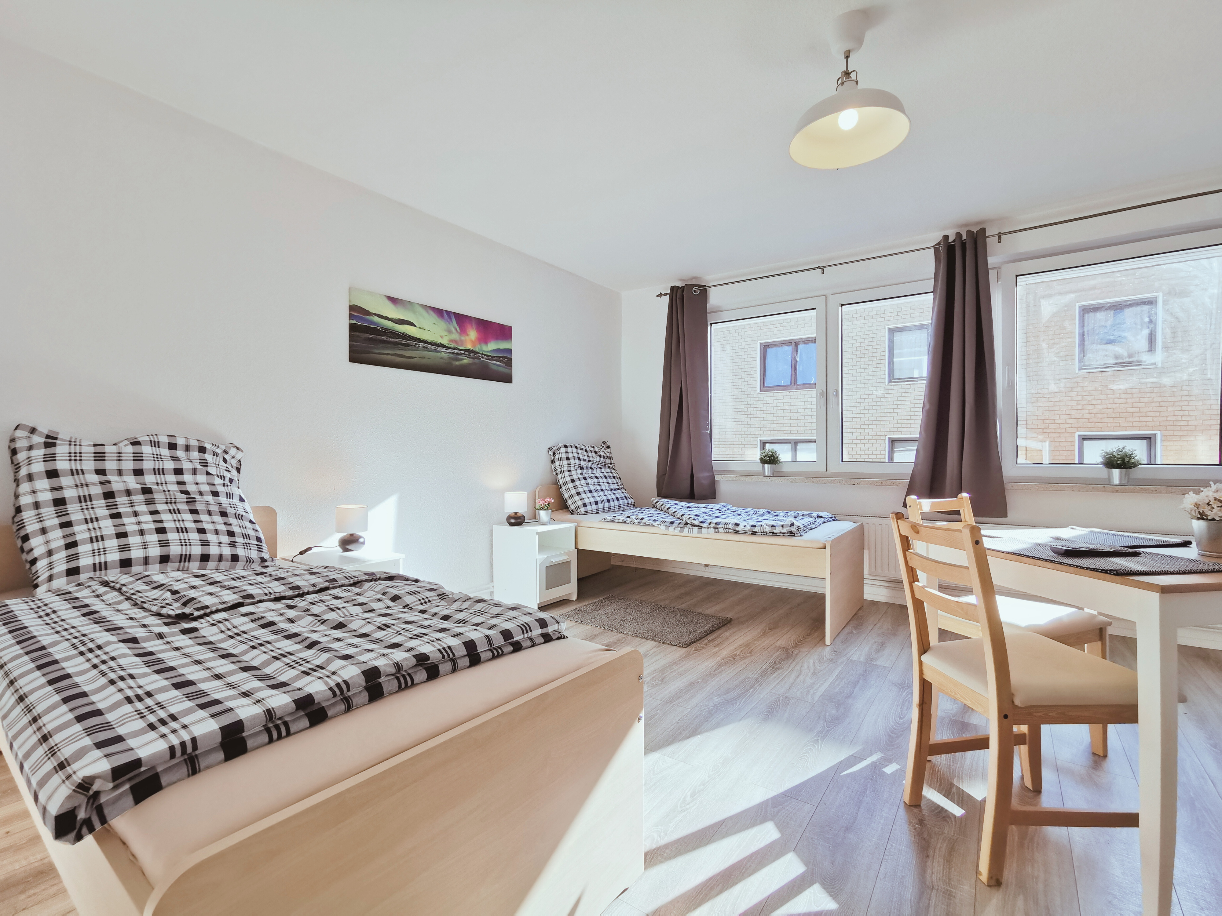 Monteurwohnung - Butjadingen Fedderwardersiel - Schlafzimmer mit zwei Einzelbetten – perfekt für Kollegen - flex living -  Monteurwohnungen in Bremerhaven