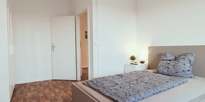 Monteurwohnung - PLZ 04109 (Deutschland) - Schlafzimmer mit zwei Einzelbetten – perfekt für Kollegen oder Freunde.
 - flex living -  Monteurwohnungen in Leipzig
