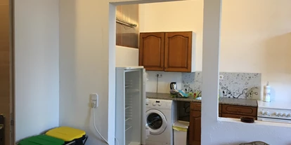 Monteurwohnung - Bettwäsche: Bettwäsche gegen Gebühr - Deutschland - Küsche mit Waschmachine und  Kühlschrank - Wohnen in der Uni-Silber-und Welterbestadt Freiberg. Whg.3