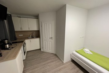 Monteurzimmer: Einzelzimmer mit Küchenzeile - Monteurzimmer in Ostseenähe
