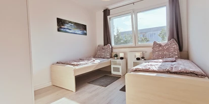 Monteurwohnung - Balkon - Deutschland - Schlafzimmer - flex living -  Monteurwohnungen in Dessau