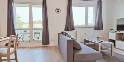 Monteurwohnung - Balkon - Deutschland - Wohnzimmer - flex living -  Monteurwohnungen in Dessau