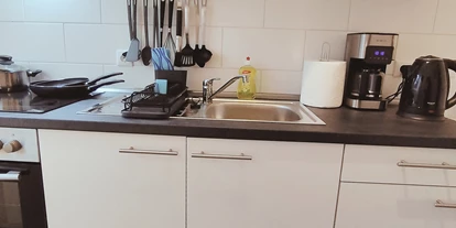 Monteurwohnung - Parkplatz: kostenlose Parkplätze in der Straße - Bremen-Umland - Küche - flex living -  Monteurwohnungen in Delmenhorst