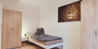 Monteurwohnung - Parkplatz: kostenlose Parkplätze in der Straße - Bremen-Umland - Schlafzimmer - flex living -  Monteurwohnungen in Delmenhorst