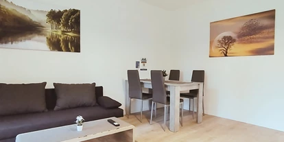Monteurwohnung - Parkplatz: kostenlose Parkplätze in der Straße - Bremen-Umland - Wohnzimmer - flex living -  Monteurwohnungen in Delmenhorst