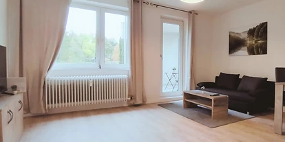 Monteurwohnung - Parkplatz: kostenlose Parkplätze in der Straße - Bremen-Umland - Wohnzimmer - flex living -  Monteurwohnungen in Delmenhorst
