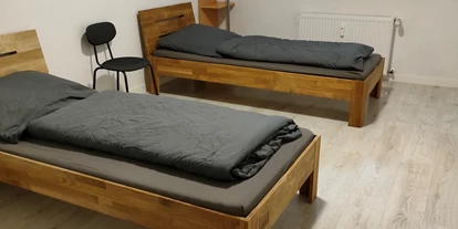 Monteurwohnung - PLZ 31860 (Deutschland) - Schlafzimmer Wohnung 2 - Easy Home Wohnen auf Zeit 5 separate Wohneinheiten