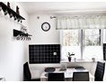 Monteurzimmer: Küche mit Sitzmöglichkeiten - Ferienwohnung Marta