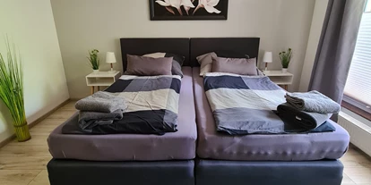 Monteurwohnung - Kaffeemaschine - Schleswig-Holstein - Bett kann auseinandergestellt werden -> 90x200 - Wohnung Am Wallmuseum 1-7 Personen