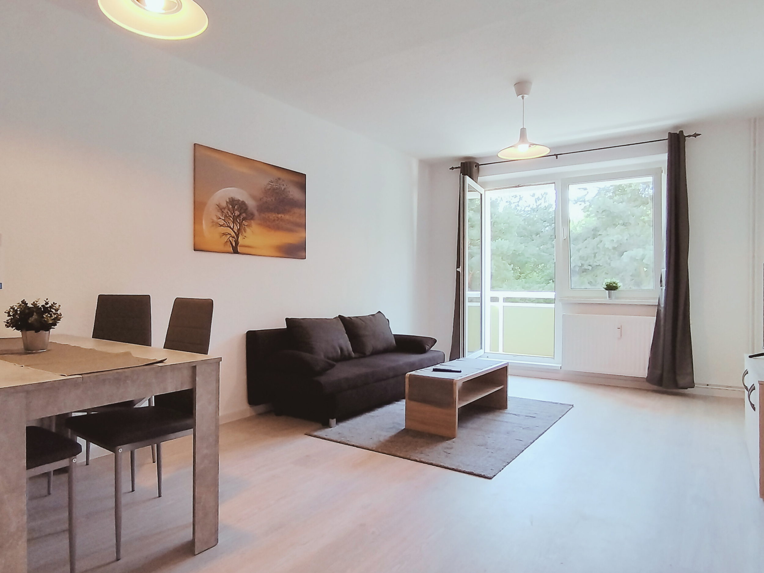 Monteurzimmer: Wohnzimmer mit Essbereich - flex living -  Monteurwohnungen in Gardelegen