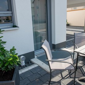 Monteurzimmer: Terrassen, Balkone und Garten für Raucher - Apartmenthaus & Ferienwohnungen Horster
