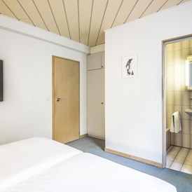 Monteurzimmer: Auch Dreibettzimmer für Monteure vorhanden - HOTEL LE POSTILLON