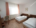 Monteurzimmer: Doppelzimmer mit getrennten Betten - Landhotel Heidepark