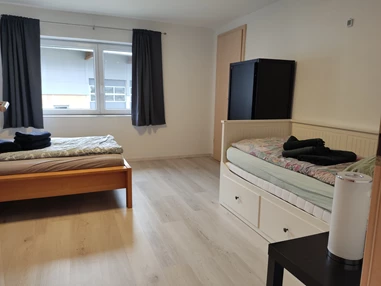 Monteurzimmer: Schlafzimmer mit zwei Einzelbetten  - Pfeils Ferienwohnung