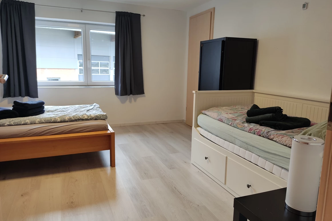 Monteurzimmer: Schlafzimmer mit zwei Einzelbetten  - Pfeils Ferienwohnung