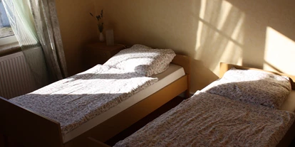 Monteurwohnung - Kaffeemaschine - Schleswig-Holstein - Schlafzimmer OG - Ferienwohnung Buttemühle