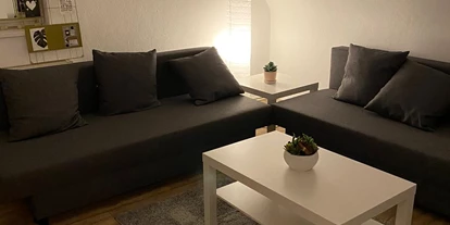 Monteurwohnung - Kaffeemaschine - Meppen - Wohnzimmer mit 2x Schlafcouch - Appartement Sütthoff