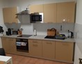Monteurzimmer: Einbauküche Penthouse am Rhein - Monteur-/Ferienwohnungen Meng nahe Bonn mit Top Ausstattung