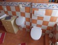 Monteurzimmer: Bad mit Pisoar und Toilette - Monteurzimmer-Hehlen