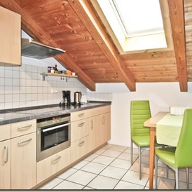 Monteurzimmer: Küche der Ferienwohnung Bergblick - Ferienwohnungen und Apartments Zunhammer
