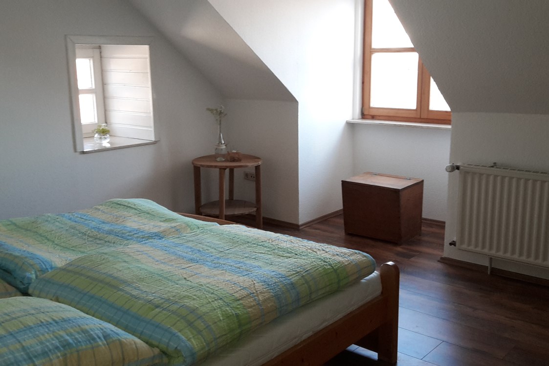Monteurzimmer: Ein weiteres Schlafzimmer - Ferienwohnung "Wohnglück" im Gasthaus "Zur Krone"