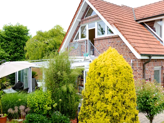 Monteurzimmer: Die kleinere Wohnung vom Garten aus gesehen - Ferienwohnungen Stenzel in Laer bei Münster