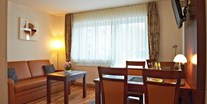 Monteurwohnung - Zimmertyp: Einzelzimmer - Deutschland - Ferienwohnung, Wohnbereich. - Hotel Wendelstein GmbH