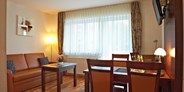 Monteurwohnung - Einzelbetten - Ferienwohnung, Wohnbereich. - Hotel Wendelstein GmbH