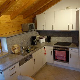 Monteurzimmer: Küche obere Wohnung mit Essplatz - Haus am Hof