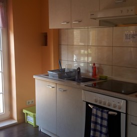 Monteurzimmer: Küche mit Balkon - Ferienwohnung Sylvia