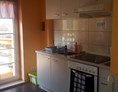 Monteurzimmer: Küche mit Balkon - Ferienwohnung Sylvia