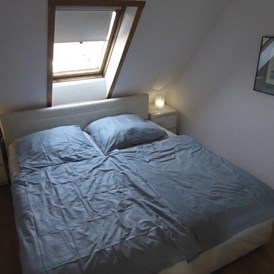 Monteurzimmer: Schlafzimmer mit Doppelbett  - Storchennest Dassow