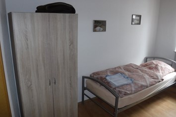 Monteurzimmer: Einzelzimmer der Wohnung im Parterre von Haus Siegner. - Haus Siegner  
