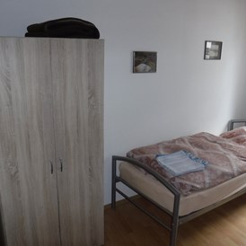 Monteurzimmer: Einzelzimmer der Wohnung im Parterre von Haus Siegner. - Haus Siegner  